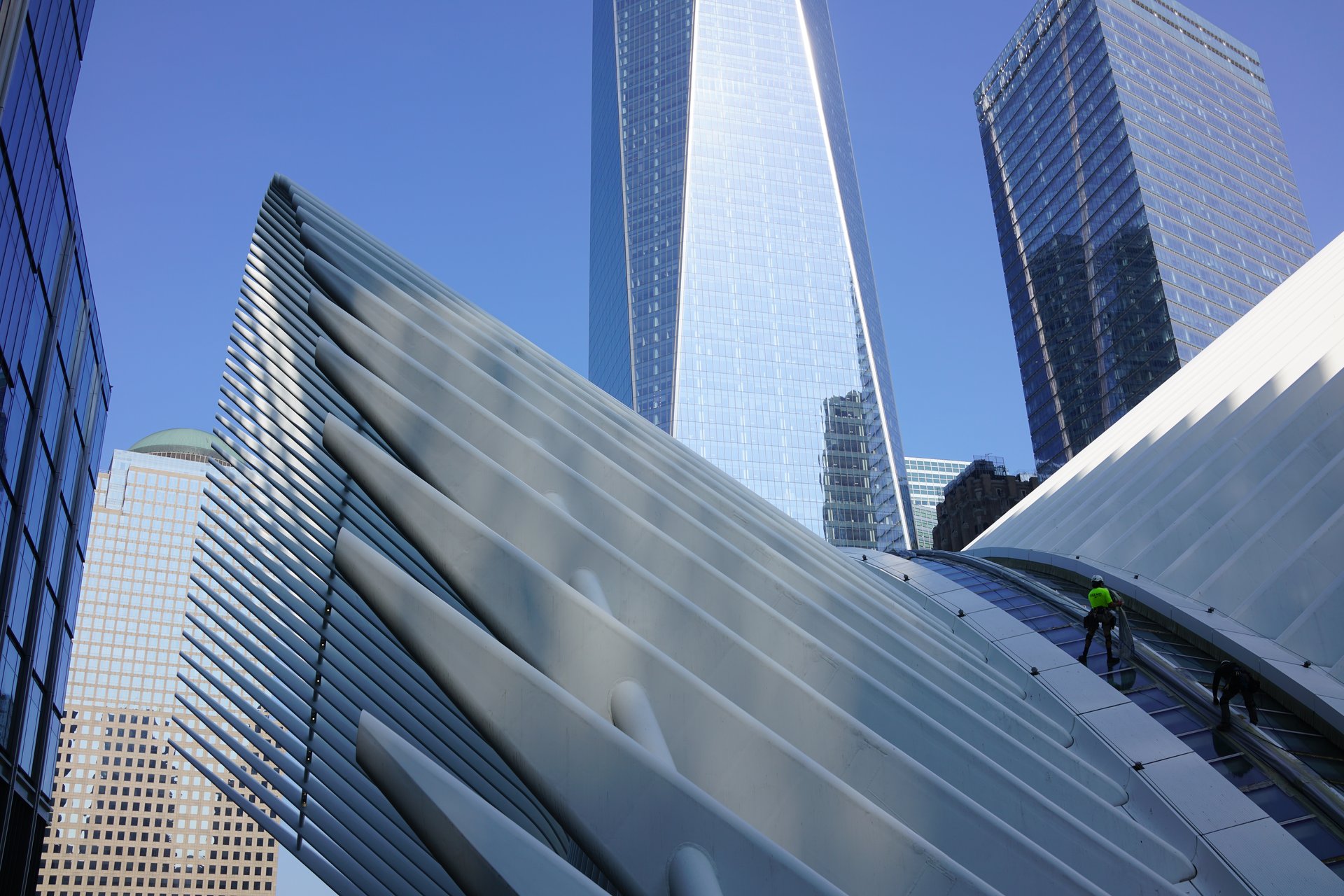 Drone inspection of Oculus wings with One WTC in the background